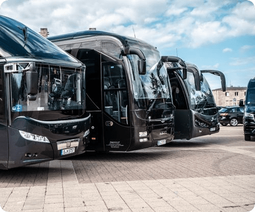 Three modern VIP buses from Drive 57, ready for comfortable and stylish transportation services in Berlin.