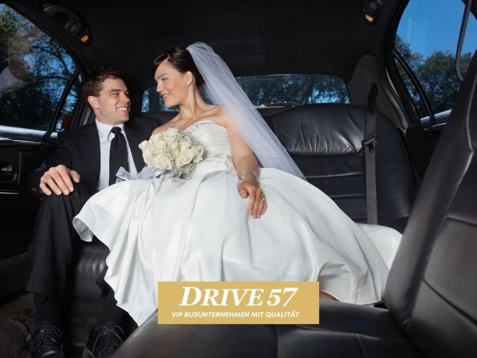 Bride and groom inside a Drive 57 wedding limousine in Berlin